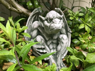 Gargoyle figure medieval dragon demon protector church figures.